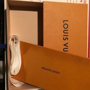 Louis Vuitton box with ribbon and envelope
